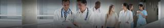 Doctors standing together talking.