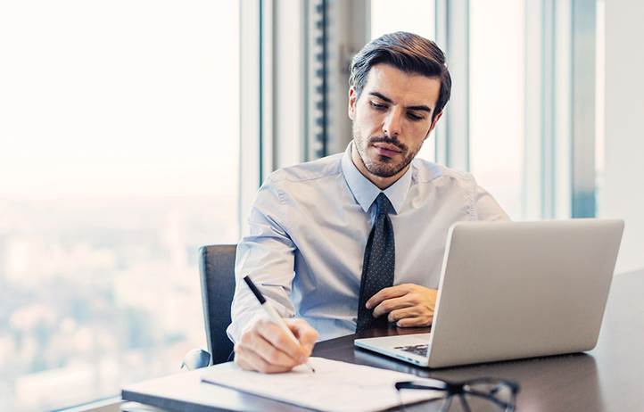Professional alone at computer