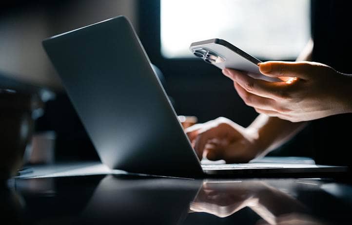 Person using multi-factor authentication to sign on to their account.