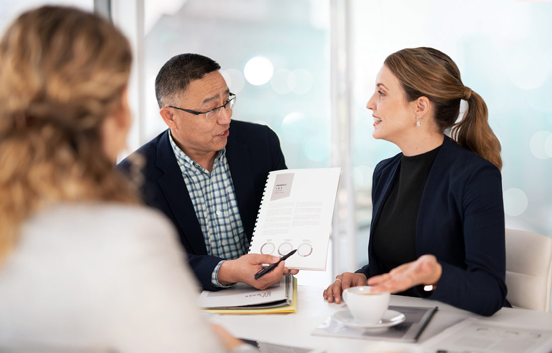 Public sector professionals in a meeting.