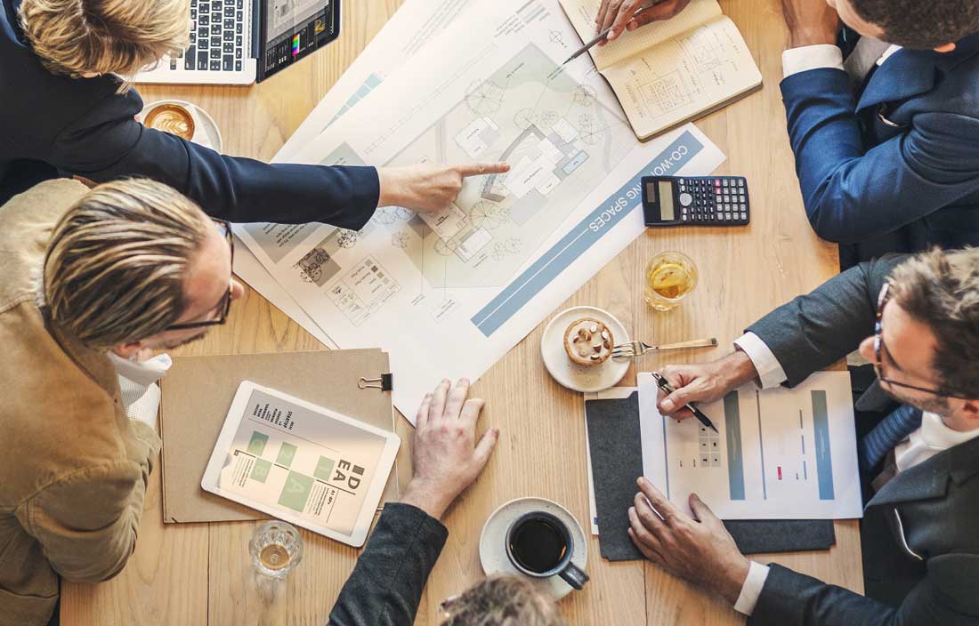 Aerial view of business professionals in a meeting.